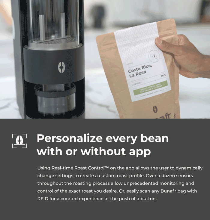 person scanning green coffee beans in front of roaster